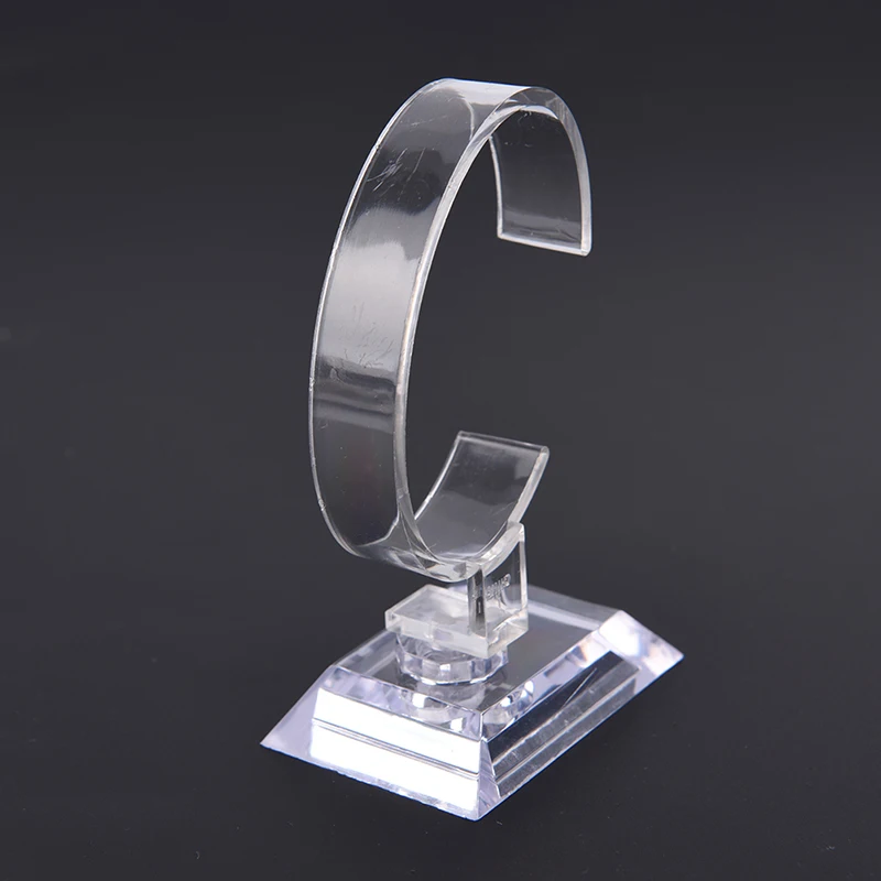 Habce2ee1392b4a8a87410f5568f16989r 10CM Plastic Wrist Watch Display Rack Holder Sale Show Case Stand Tool Clear Jewelry Packaging Total Height Watch Display Stand