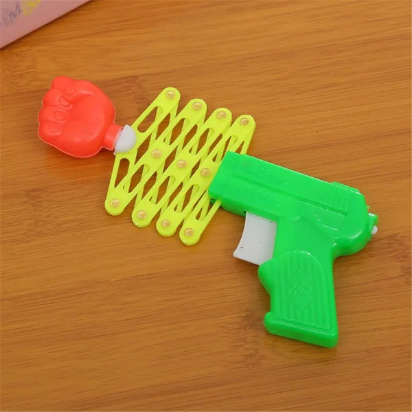 Hot Funny Retractable Fist Shooter Trick Toy Funny Child Kids Plastic Party Festival Gift Classic Elastic Telescopic Fist Toy - Image 3